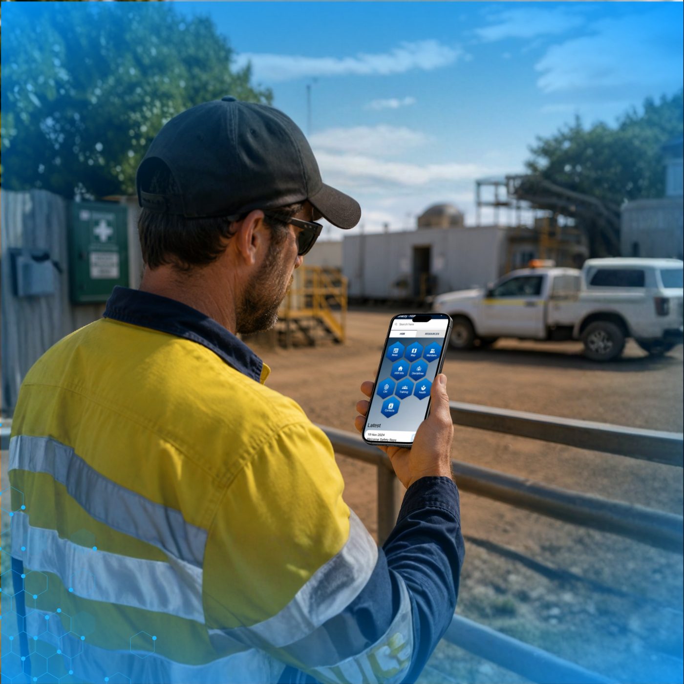 A safety rep at a mine site viewing the Co Connect HSR app home screen with News, Map, Members, HSR Info and Disciplines